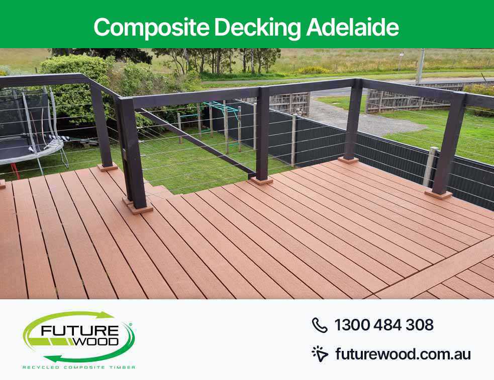 A balcony made of composite decking boards with railing and fence in Adelaide