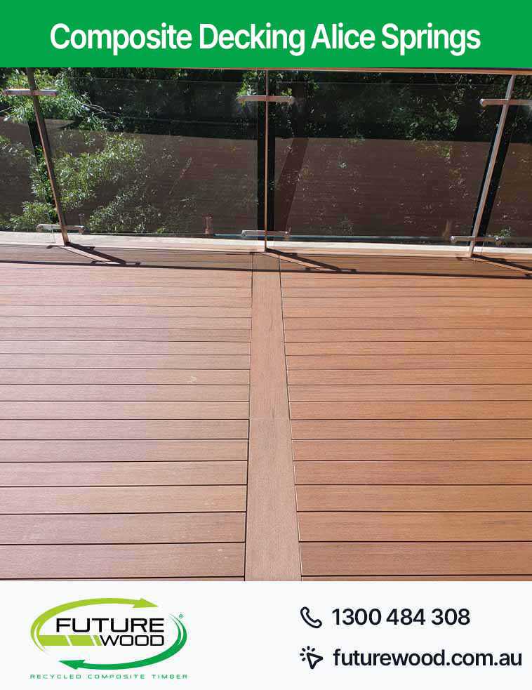 Picture of a deck with a glass railing, made of composite decking boards in Alice Springs