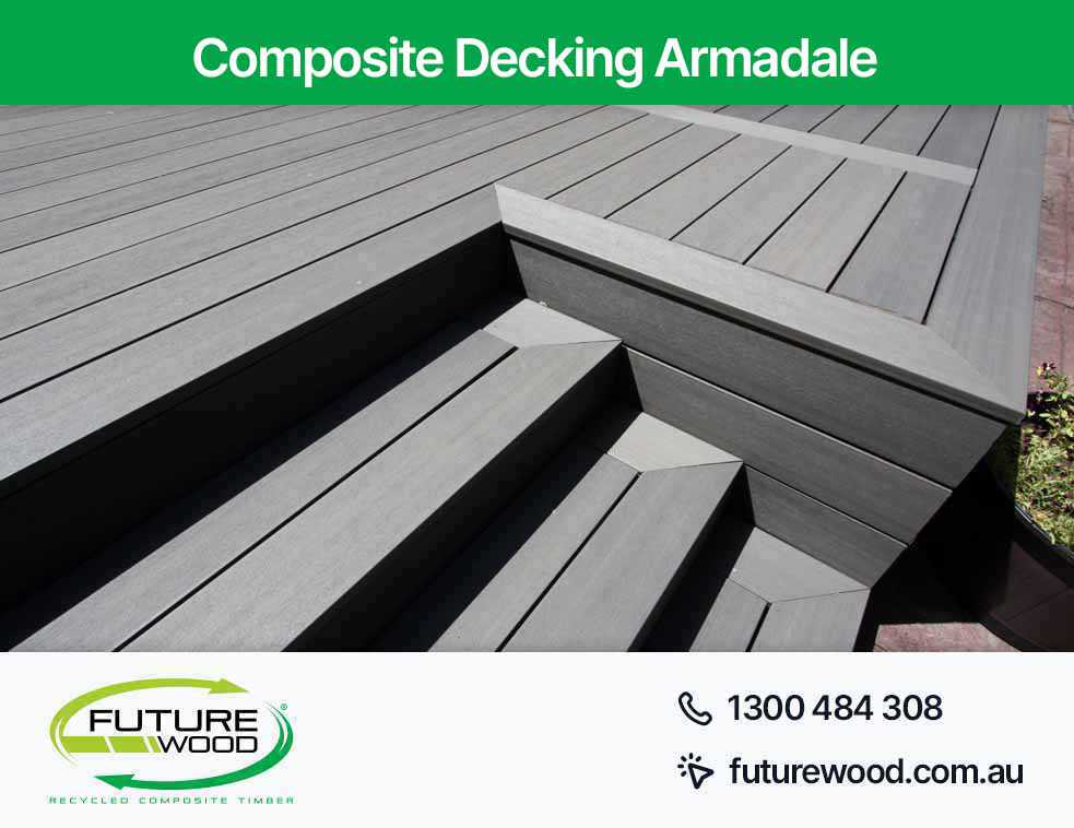 Picture of a composite deck boards with grey steps and a patio in Armadale