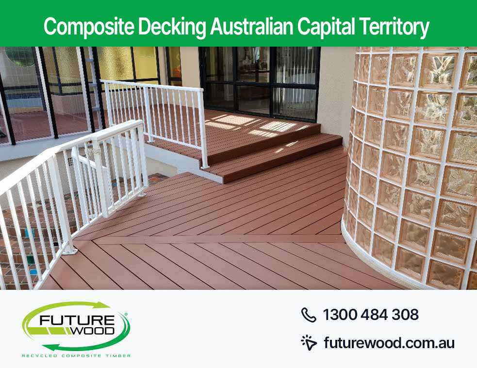 Photo of a deck made of composite decking boards in Australian Capital Territory, with a white railing