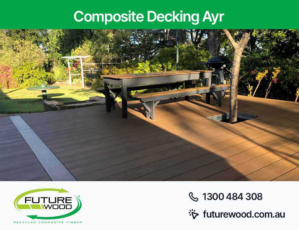 Image of outdoor seating area in Ayr with composite deck boards, benches, and a table