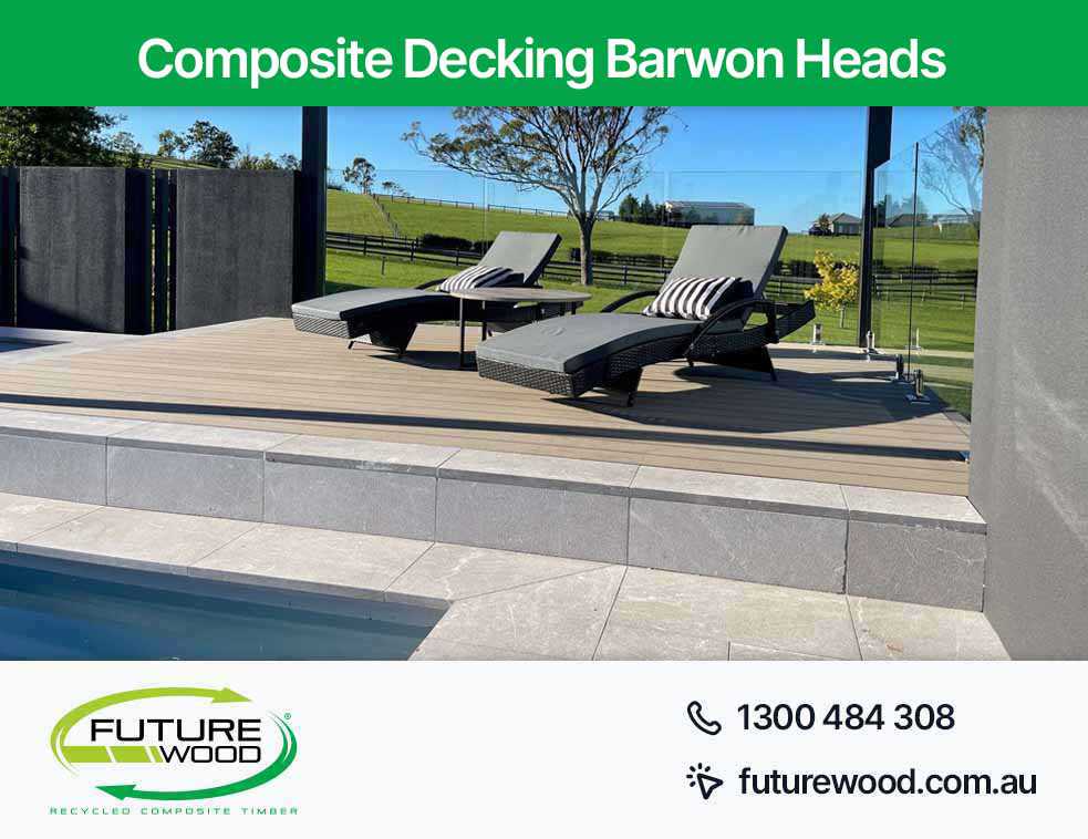 Image of a serene pool in Barwon Heads with lounge chairs and a floor made of composite decking boards