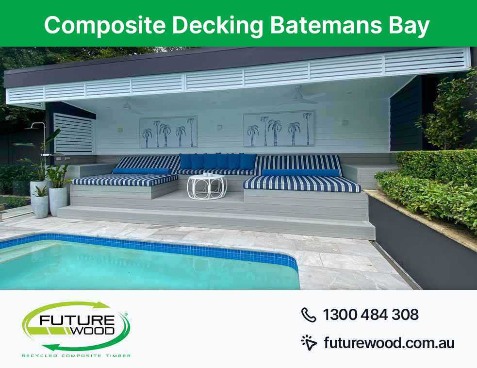 Image of composite deck boards on a pool with blue and white cushions in Batemans Bay