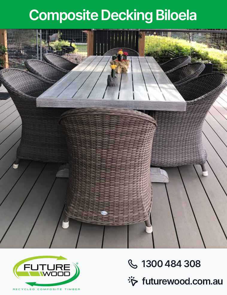 Composite decking boards with a table and chairs set in Biloela
