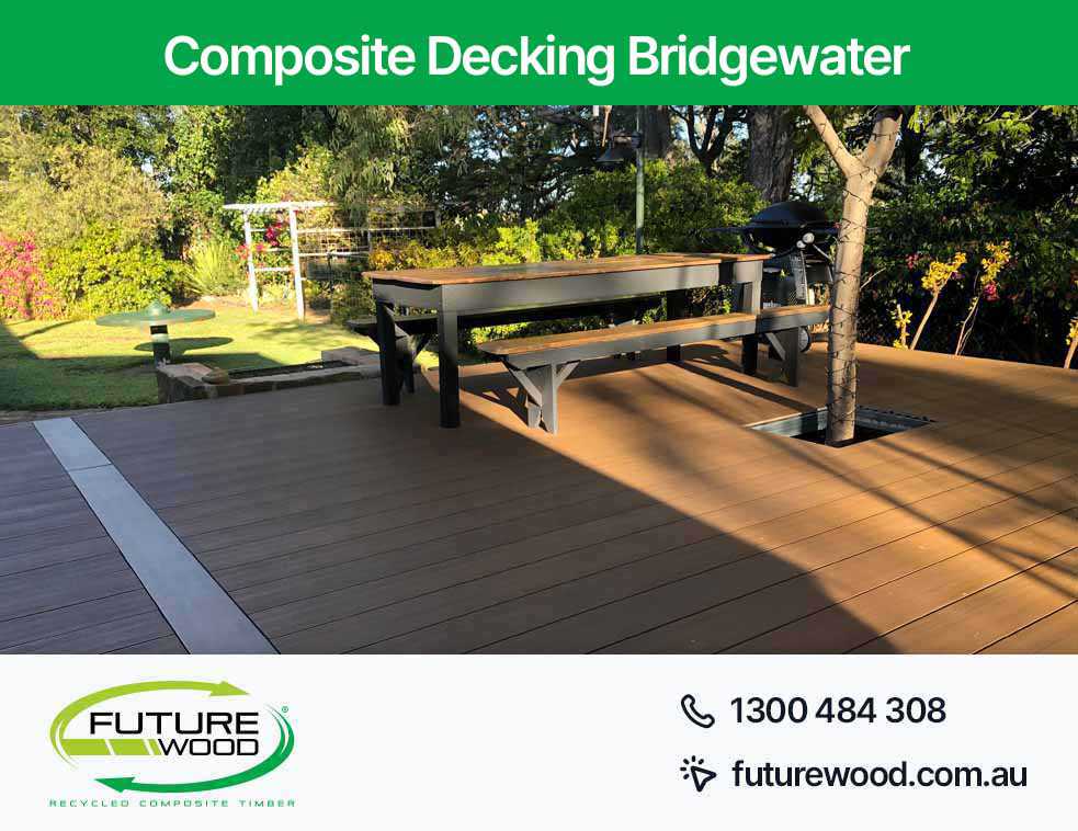 A picnic area in Bridgewater on a deck with composite decking boards, benches and a table
