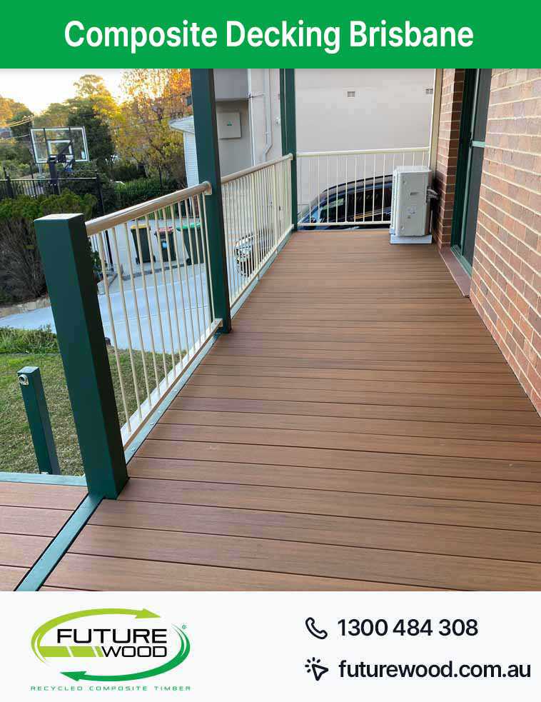 A deck made of composite decking boards with railings in Brisbane