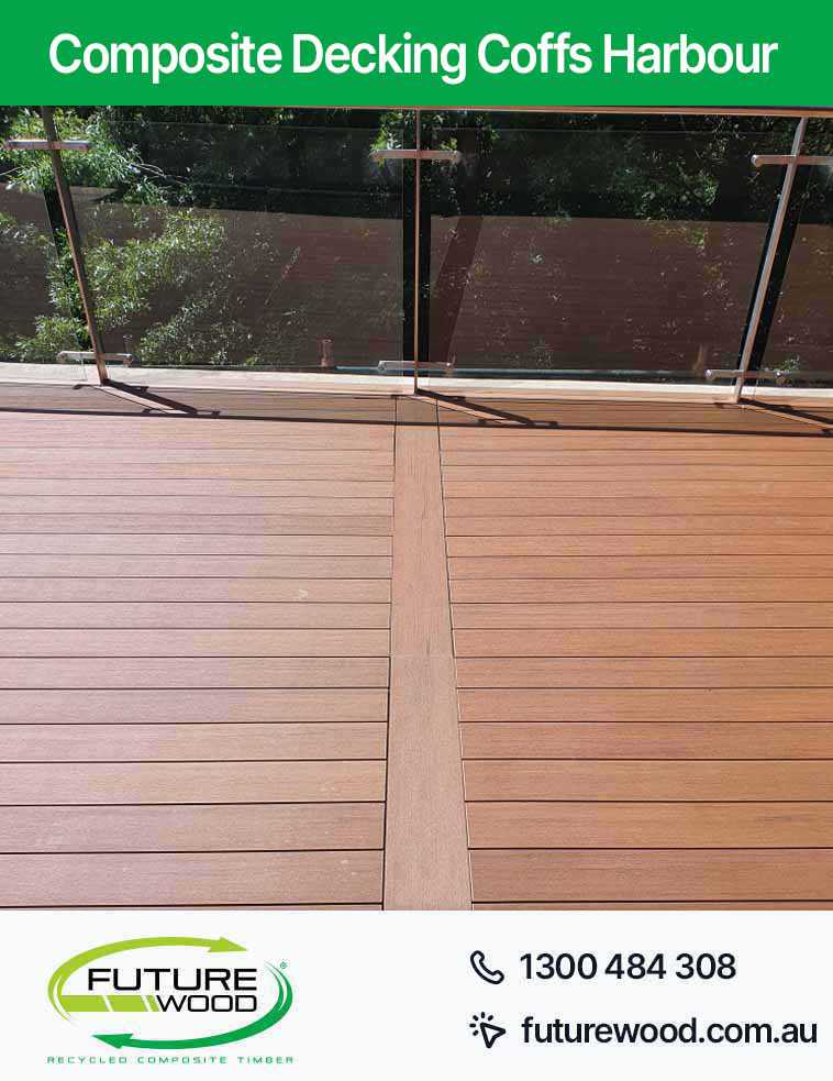 Image of deck made of composite decking boards in Coffs Harbour with glass railing