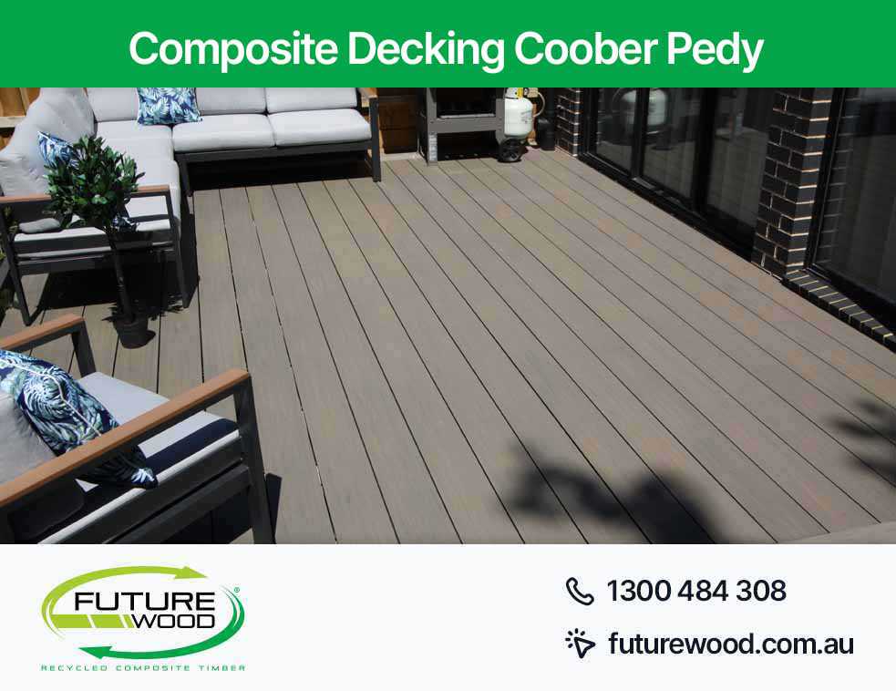 Outdoor living space in Coober Pedy with furniture on a composite deck boards