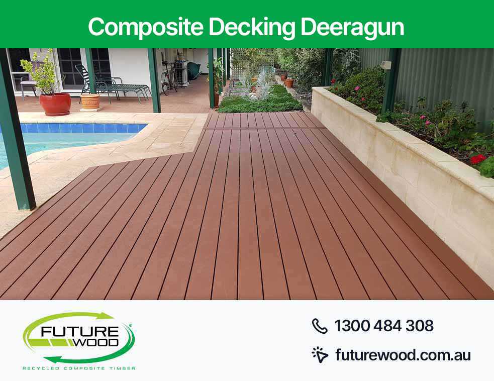 A composite deck boards, featuring a pool and patio in Deeragun