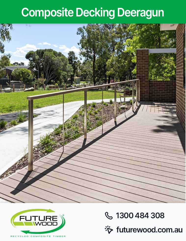 Picture of a composite decking boards walkway with a railing in Deeragun