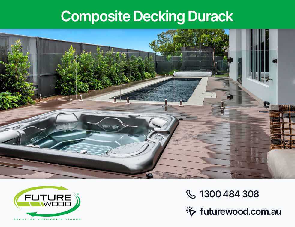 Photo of hot tub and pool set on a composite decking boards in Durack