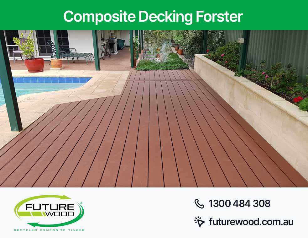 Picture of composite deck boards with pool and patio area in Forster