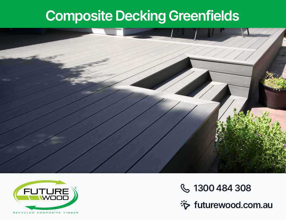 Image of a poolside deck in Greenfields with composite decking boards and steps