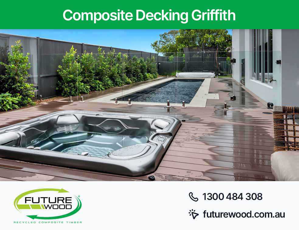 Image of hot tub and pool combo, nestled on a composite deck boards in Griffith
