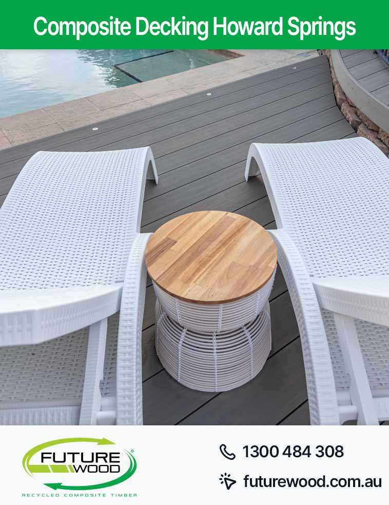Image of two white chairs on a composite decking boards near a pool in Howard Springs