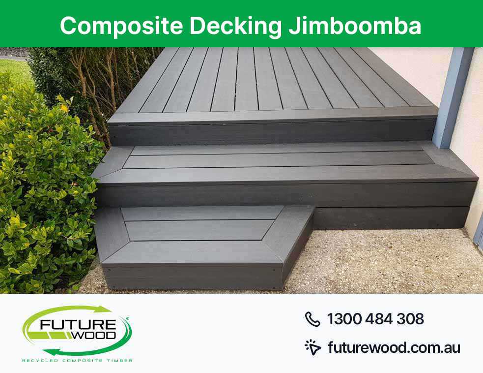 Black decking boards with steps made of composite material in Jimboomba