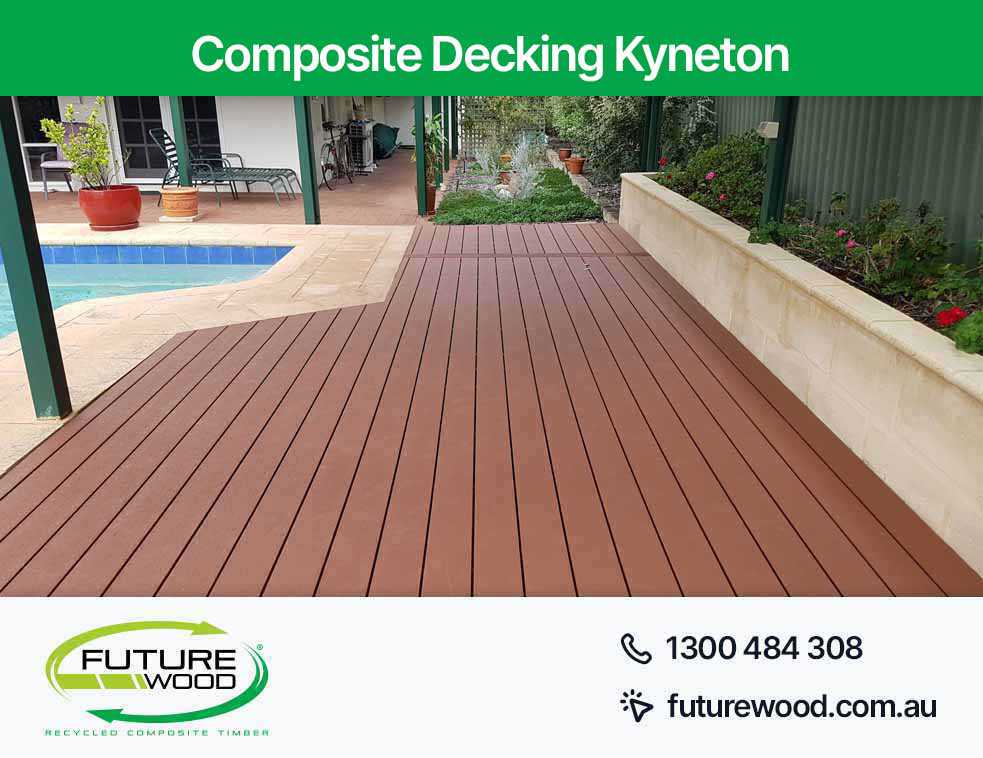 Image of outdoor space in Kyneton with composite decking boards, pool and patio