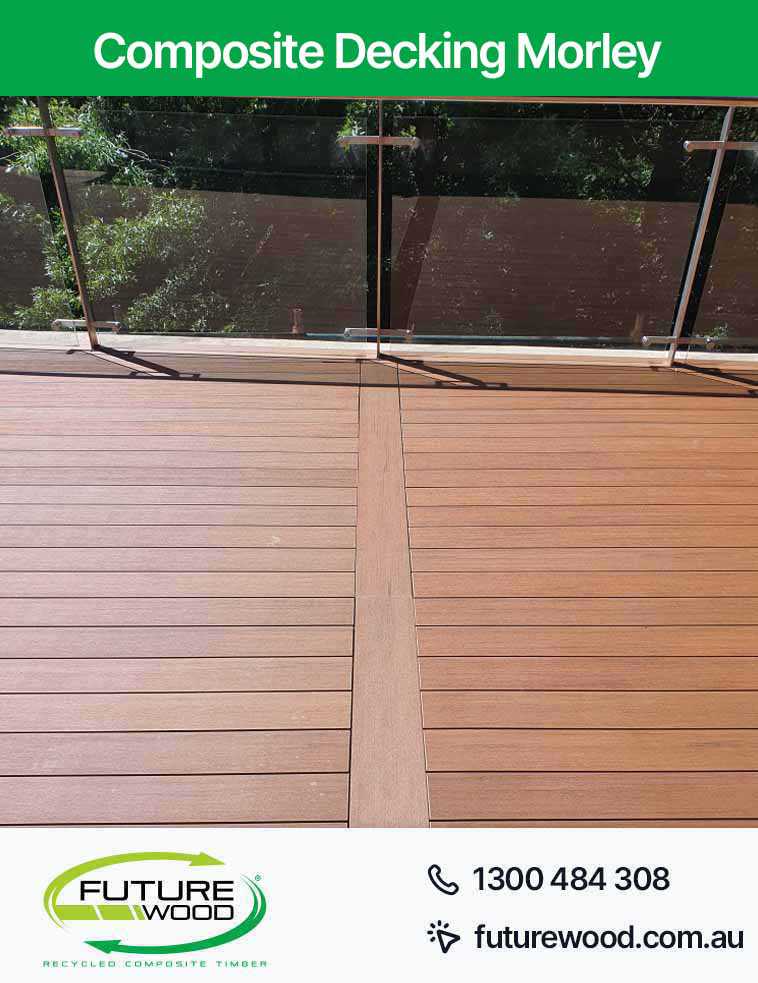 Picture of a deck with a glass railing, made of composite decking boards in Morley