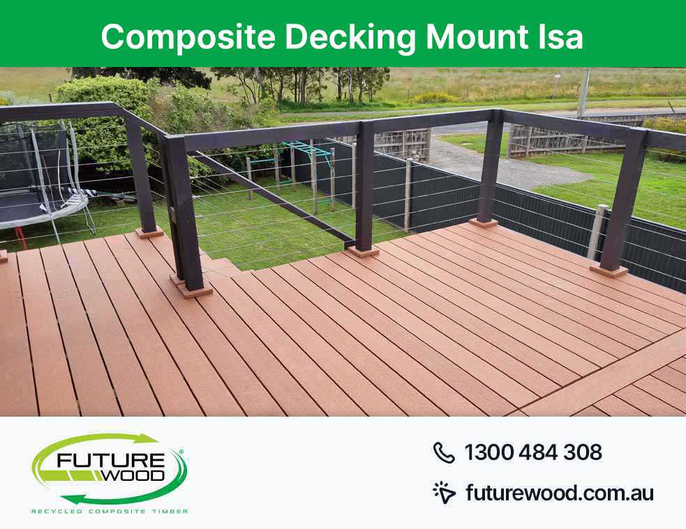 A balcony made of composite decking boards with railing and fence in Mount Isa