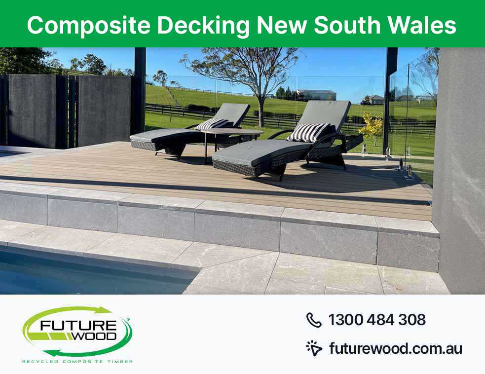 Picture of a pool in New South Wales surrounded by lounge chairs and a floor made of composite decking boards
