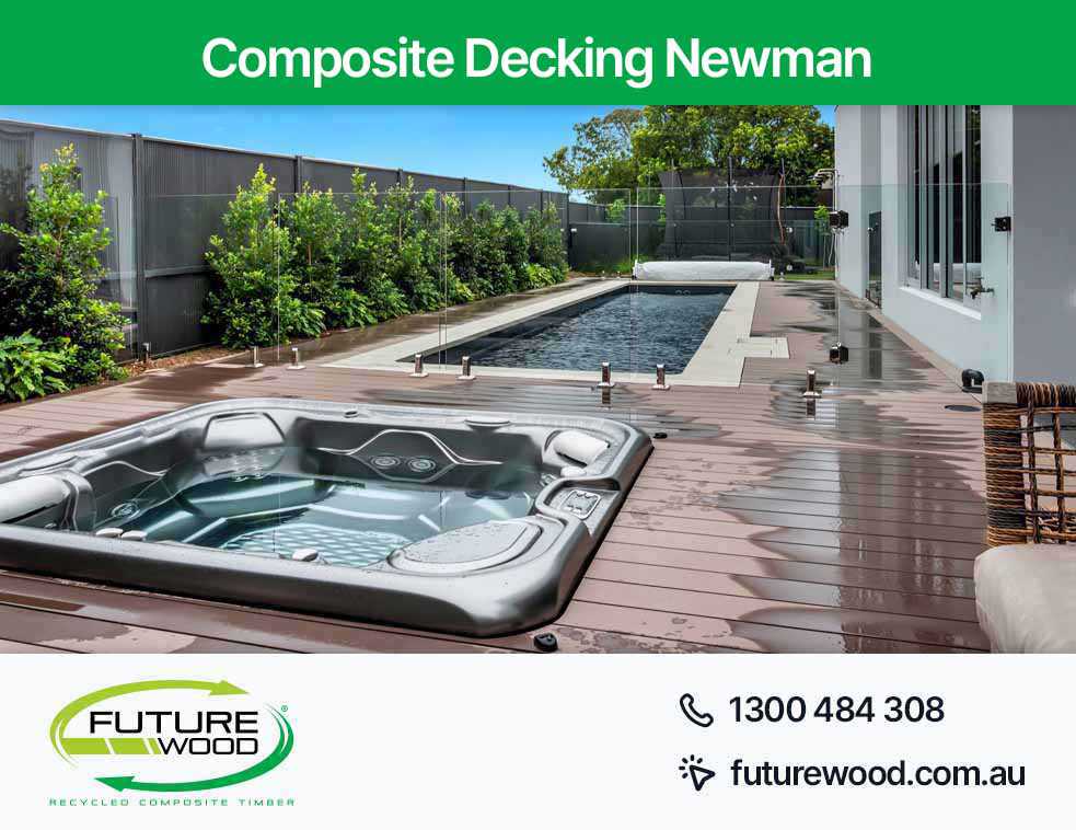 Image of hot tub and pool combo, nestled on a composite deck boards in Newman