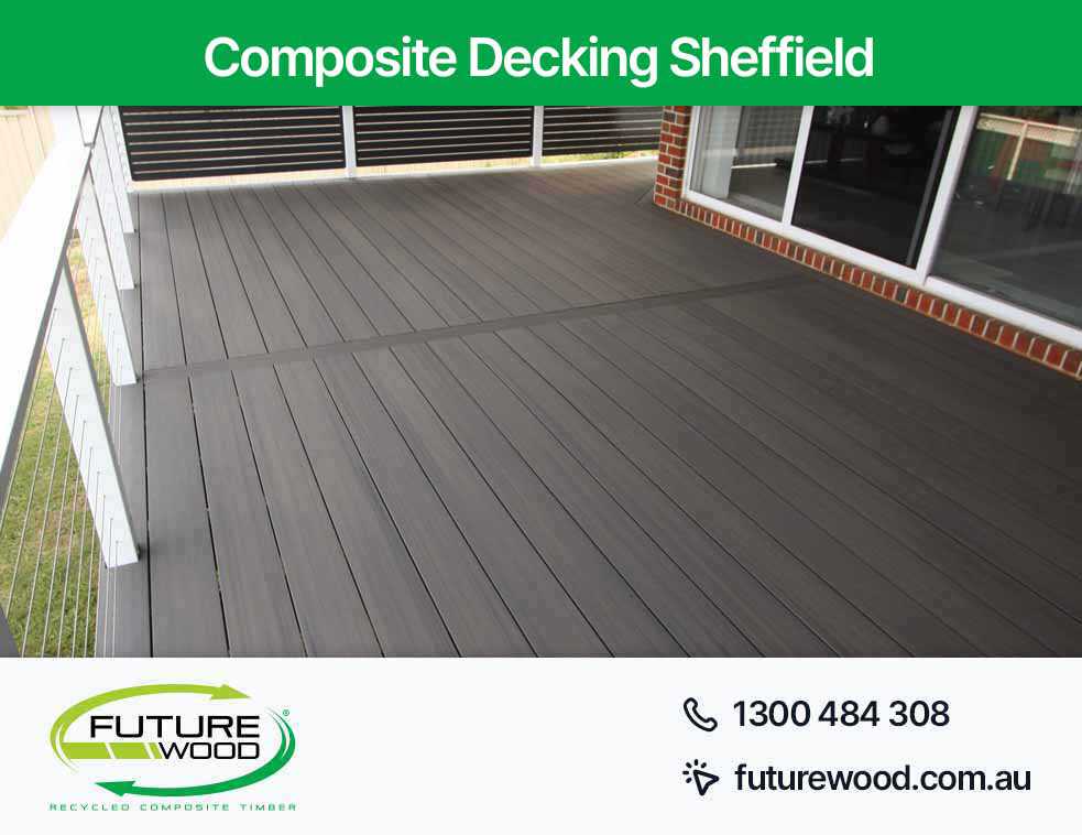 An image of a composite decking boards in Sheffield featuring a railing