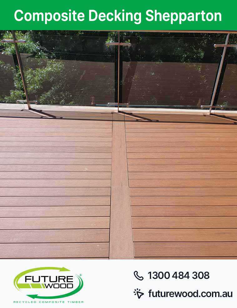 Picture of a deck with a glass railing, made of composite decking boards in Shepparton