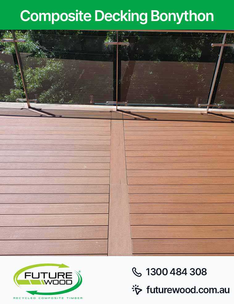Picture of a deck with a glass railing, made of composite decking boards in Bonython