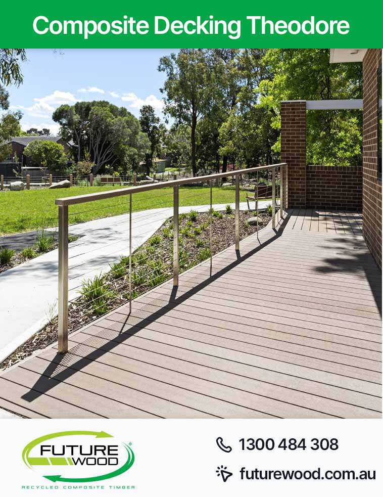 An image of a railing on a walkway made of composite decking boards in Theodore