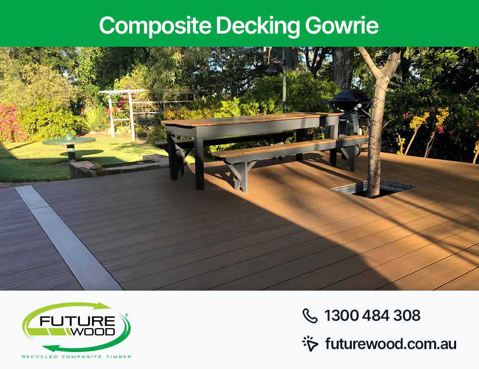 Image of outdoor seating area in Gowrie with composite deck boards, benches and a table