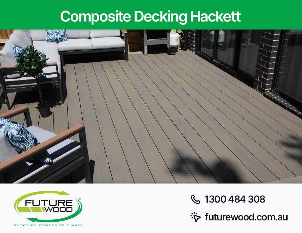 Picture of composite deck boards with stylish furniture and outdoor patio in Hackett