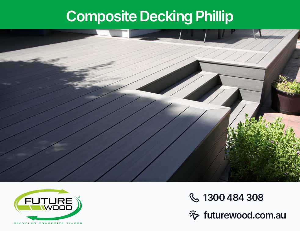 Photo of deck featuring composite decking boards and pool access via steps in Phillip